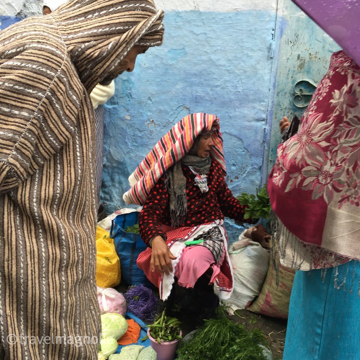 A Berber woman sells herbs in Chefchaouen on market day ©travelmagnolia2016